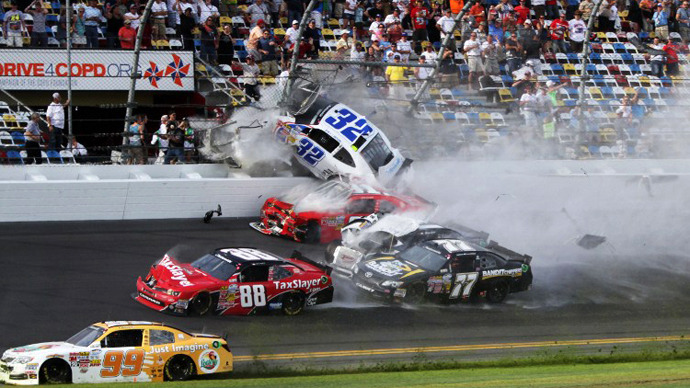 An incident at the finish of the NASCAR Nationwide Series DRIVE4COPD 300 at Daytona International Speedway on February 23, 2013. (AFP Photo / Jerry Markland)
