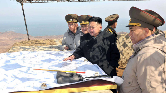 This undated picture, released from North Korea's official Korean Central News Agency on March 10, 2012 shows North Korean leader Kim Jong Un (C) inspecting Cho Islet defending a forward post on the west coast in North Korea.(AFP Photo / KCNA)