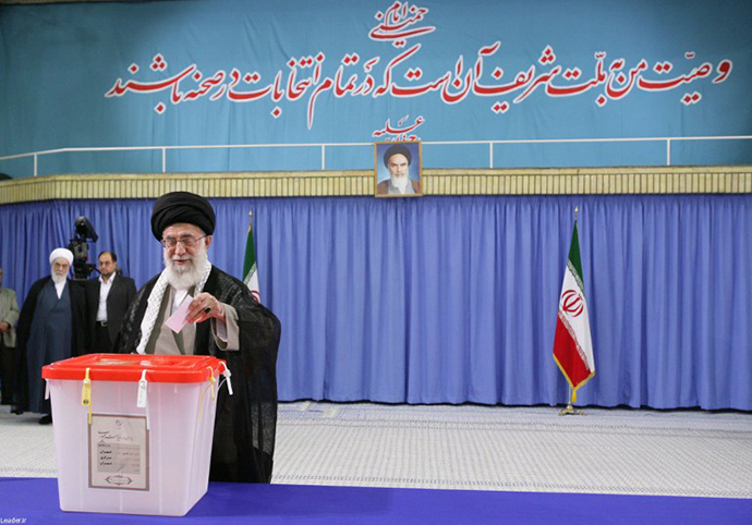 A handout picture released by the official website of the Iranian supreme leader Ayatollah Ali Khamenei shows him casting his vote in Tehran on June 14, 2013. (AFP Photo)