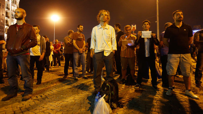 Erdem Gunduz stands in a silent protest at Taksim Square in Istanbul early June 18, 2013.(Reuters / Marko Djurica)