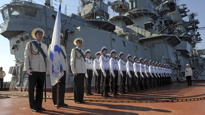 Russia's nuclear-powered missile cruiser Pyotr Veliky navy sailors attend a greeting ceremony for the Russian official delegation at Syria's Mediterranean port of Tartus. (RIA Novosti)