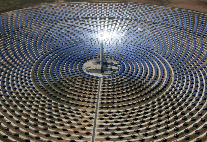 This handout picture released by Gemasolar shows the Torresol Energy Gemasolar thermasolar plant in Fuentes de Andalucia near Sevilla, southern Spain. (AFP Photo/Gemasolar)