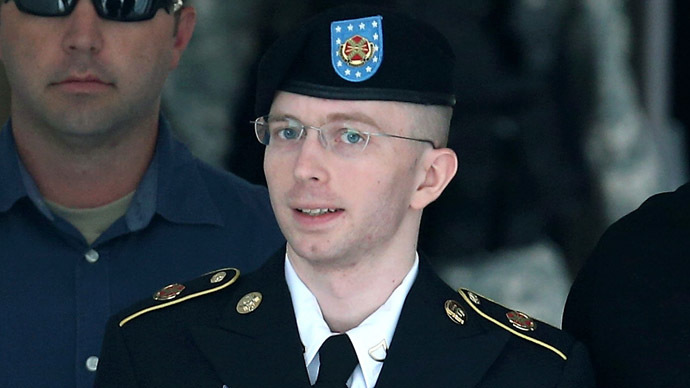 U.S. Army Private First Class Bradley Manning is escorted by military police as he leaves his military trial after he was found guilty of 20 out of 22 charges, July 30, 2013 Fort George G. Meade, Maryland.  (Mark Wilson/Getty Images/AFP)