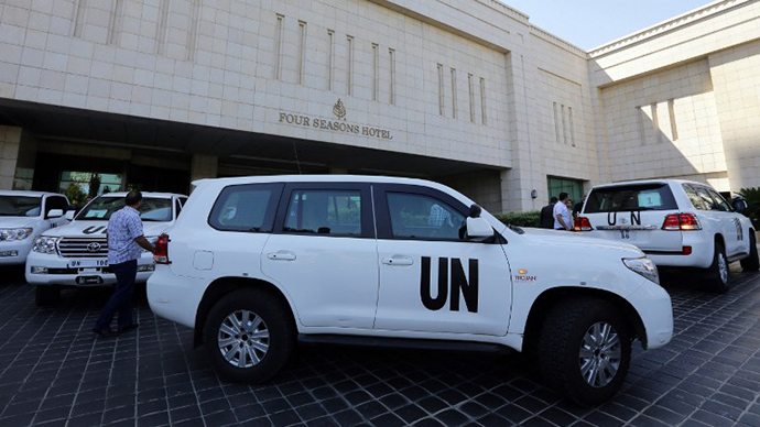 The UN chemical weapons investigation team arrives in Damascus on August 18, 2013. (AFP Photo / Louai Beshara)