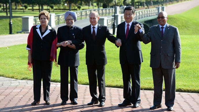 President of the Federative Republic of Brazil Dilma Vana Rousseff, Prime Minister of the Republic of India Manmohan Singh, second left, President of the Russian Federation Vladimir Putin, President of the People's Republic of China Xi Jinping and President of the Republic of South Africa Jacob Zuma, from left, pose for group photographs.(RIA Novosti / Alexey Maishev)