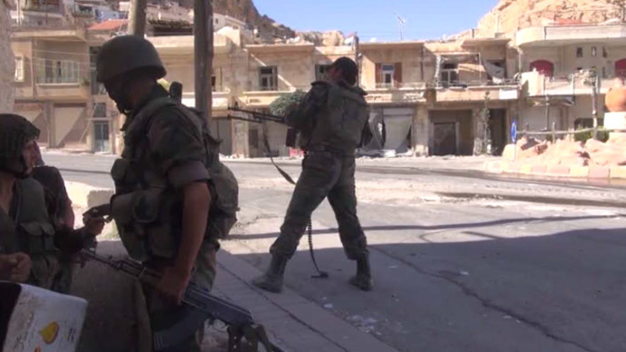 Syrian Army battles jihadists in ancient Christian village
