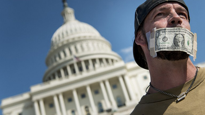 John Zangas, a furloughed worker, protests the government shutdown on Capitol Hill on October 2, 2013 in Washington, DC. (AFP Photo / Brendan Smialowski)