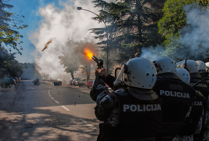 Police fire teargas at opponents of same-sex rights in Podgorica October 20, 2013 (Reuters / Stevo Vasiljevic)