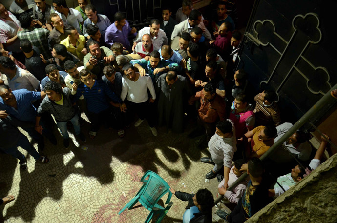 Gunmen kill 3 in shooting spree at Egyptian Coptic church