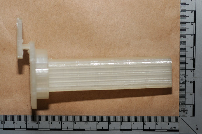 A handout picture taken on October 24, 2013 and released by Greater Manchester Police on October 25, 2013 shows a plastic component that British police suspect to be a magazine that could be used to make a viable 3D-printed gun, seized by police during searches as part of an operation in the Baguley area of Manchester, northwest England on October 24, 2013. (AFP Photo)