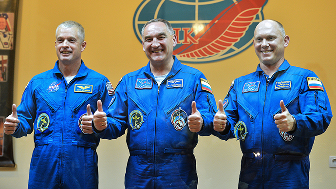 From left: NASA astronaut Steven Swanson and Roscosmos cosmonauts Alexander Skvortsov and Oleg Artemyev, crew members of the latest mission to the International Space Station (ISS), during a press conference ahead of the launch of the Soyuz-FG with the transport manned spacecraft (TPK) Soyuz TMA-12M at the Baikonur cosmodrome on March 24, 2013. (RIA Novosti / Ramil Sitdikov)