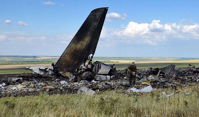 The debris of an IL-76 transporter which was taken down by pro-Russian rebels early on June 14, on the outskirts of Lugansk June 14, 2014. (AFP Photo / Daniel Mihailescu)