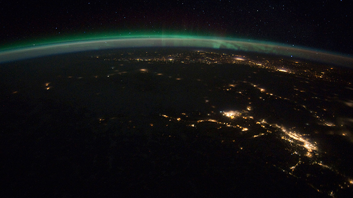 The pan-aurora borealis is visible over Vancouver, British Columbia and Seattle, Washington at night (Reuters / NASA)