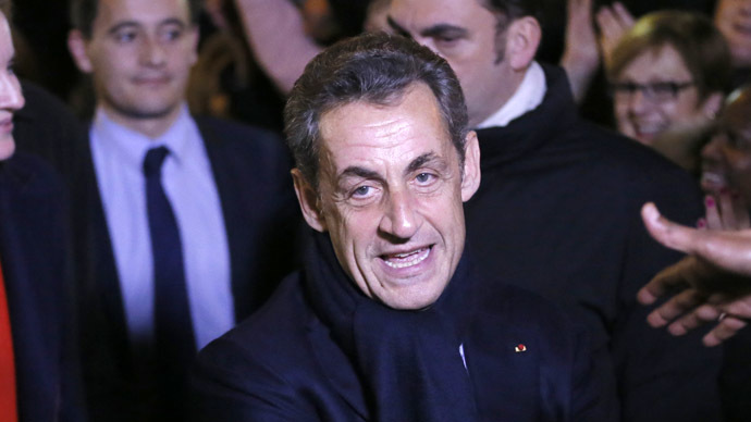 Former French president Nicolas Sarkozy is greeted by well-wishers as he leaves his campaign headquarters after he won his UMP (Union for a Movement Popular) politial party member's online vote for its new leader in Paris November 29, 2014. (Reuters/Gonzalo Fuentes)