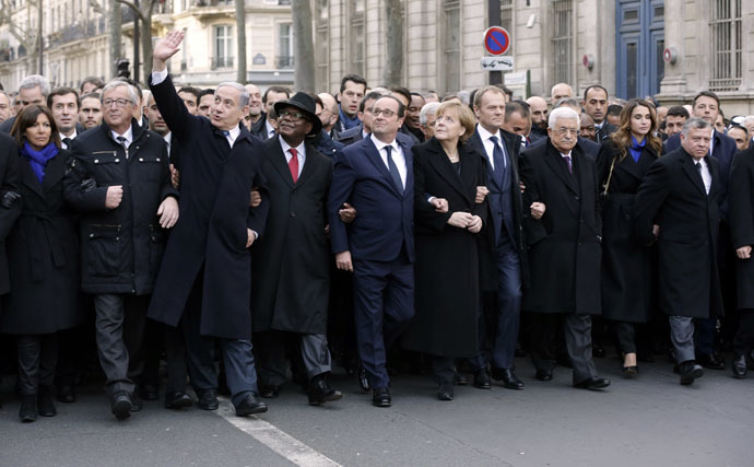 (From L) The Mayor of Paris Anne Hidalgo, European Commission President Jean-Claude Juncker, Israeli Prime Minister Benjamin Netanyahu, Malian President Ibrahim Boubacar Keita, French President Francois Hollande, German Chancellor Angela Merkel, European Union President Donald Tusk, Palestinian president Mahmud Abbas, Jordan's Queen Rania and King Abdullah II and Italian Prime Minister Matteo Renzi take part in a Unity rally “Marche Republicaine” in Paris on January 11, 2015 in tribute to the 17 victims of a three-day killing spree by homegrown Islamists. (AFP Photo)