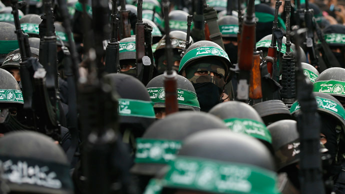Palestinian members of al-Qassam Brigades, the armed wing of the Hamas movement, during military parade in Gaza City December 14, 2014. Reuters / Mohammed Salem