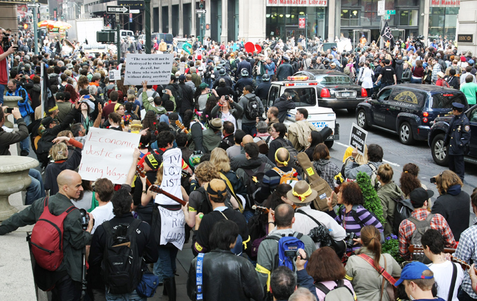 Hundreds of Occupy Wall Street demonstrators march towards Union Square as they leave Bryant Park during a May Day rally on May 1, 2012 in New York City (AFP Photo / Monika Graff)