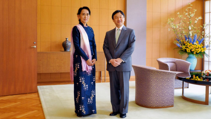 Nobel laureate and Myanmar opposition leader Aung San Suu Kyi (L) and Japanese Crown Prince Naruhito posing for photographers during their meeting at the latter's residence Togu Palace in Tokyo. Suu Kyi is on a week-long visit to Japan.(AFP Photo / Imperial Household Agency)