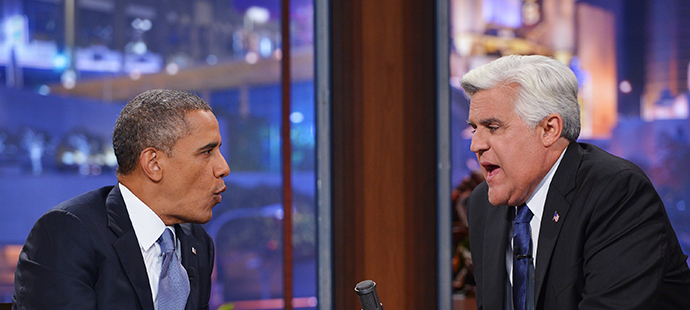 US President Barack Obama chats with host Jay Leno during a taping of The Tonight Show with Jay Leno at NBC Studios on August 6, 2013 in Burbank, California. (AFP Photo / Mandel Ngan)