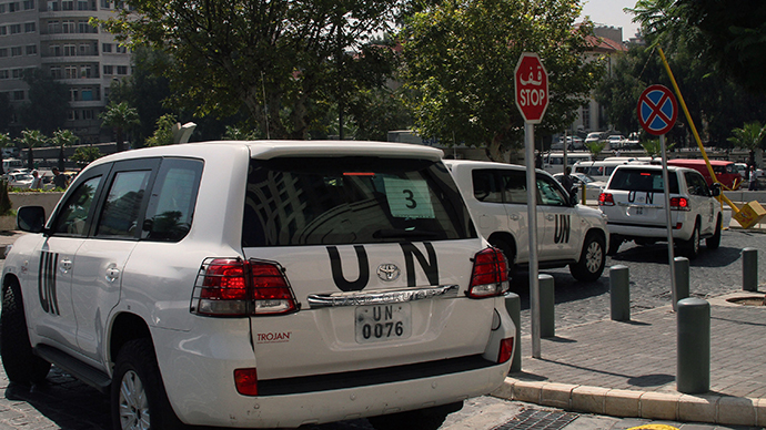 A convoy of United Nations (UN) vehicles leave a hotel in Damascus on August 26, 2013 carrying UN inspectors travelling to the site of a suspected deadly chemical weapon attack the previous week in Ghouta, east of the capital. (AFP Photo)