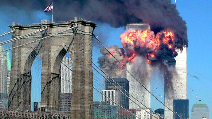FILE PHOTO - Both towers of the World Trade Center burn after being hit
by planes in New York September 11, 2001. (Reuters/Sara K. Schwittek)