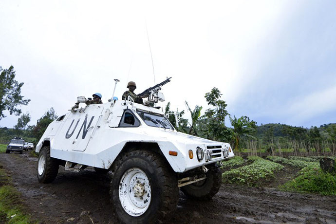 A UN mission in DR Congo (MONUSCO) armored personnel carrier patrols on November 5, 2013 on Chanzu hill, 80 kilometres north of regional capital Goma, in the eastern North Kivu region that was one of the M23 rebels' last stands. (AFP Photo / Junior D. Kannah)