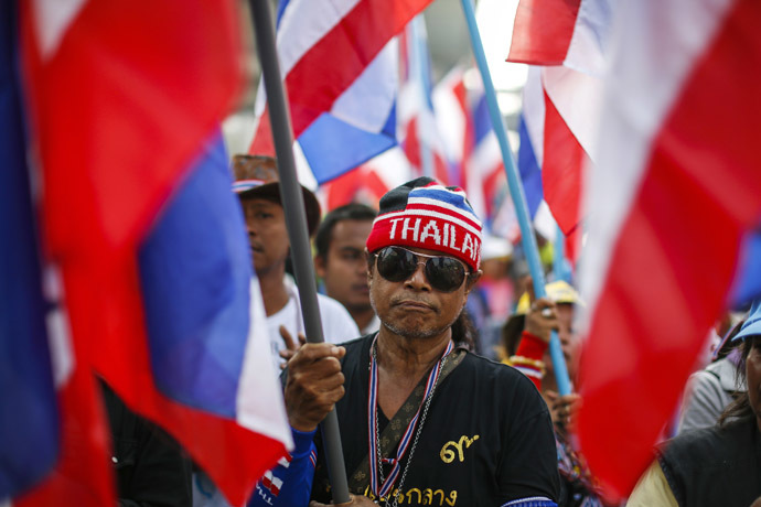An anti-government protester takes part in a rally in central Bangkok January 30, 2014. (Reuters/Athit Perawongmetha)