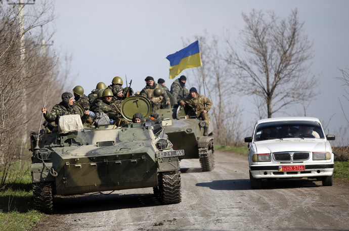Ukrainian soldiers drive on an airborne combat vehicle near Kramatorsk, in eastern Ukraine April 16, 2014. (Reuters/Marko Djurica)