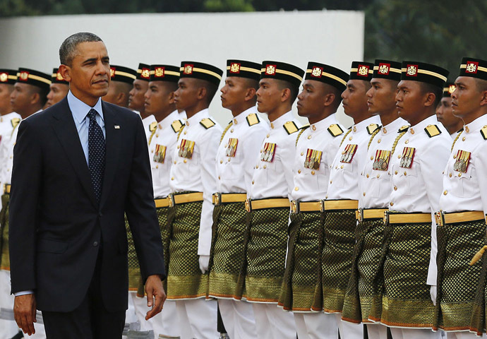 U.S. President Barack Obama inspects an honor guard during a welcoming ceremony at Parliament Square in Kuala Lumpur April 26, 2014. (Reuters)