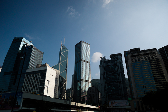 Prédios altos são vistos no distrito financeiro de Hong Kong (AFP Photo / Philippe Lopez)