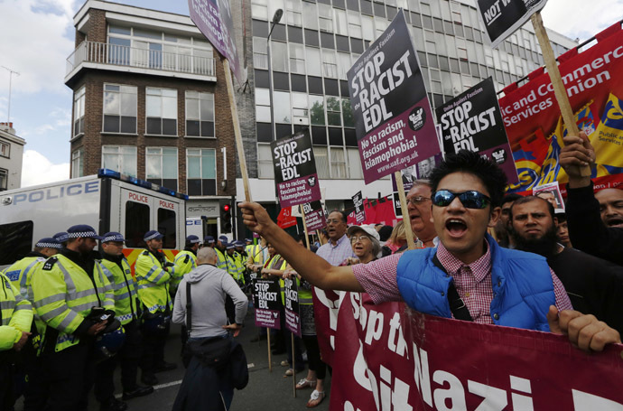 People demonstrate against a rally by the right-wing and anti-Islamist English Defence League (EDL), in London September 7, 2013. (Reuters//Luke MacGregor)