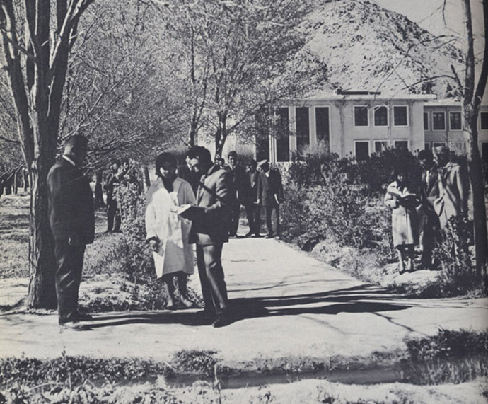  Original caption: "Kabul University students changing classes. Enrollment has doubled in last four years." The physical campus of Kabul University, pictured here, does not look very different today. But the people do. In the 1950s and '60s, students wore Western-style clothing; young men and women interacted relatively freely. Today, women cover their heads and much of their bodies, even in Kabul. A half-century later, men and women inhabit much more separate worlds.
