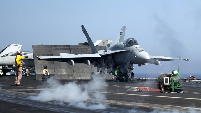 A picture released by the US Navy shows an F/A-18C Hornet assigned to the Rampagers of Strike Fighter Squadron (VFA) 83 preparing to launch from the flight deck of the aircraft carrier USS Dwight D. Eisenhower (CVN 69) on June 17, 2013 in the Mediterranean Sea. (AFP Photo/US Navy)